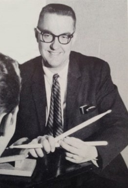 photo of Harry Brabec with drumsticks